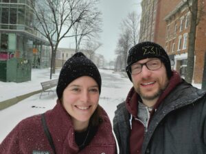 a couple of people posing for the camera
