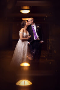 a woman standing in a dark room