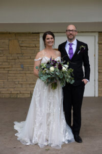 a man and a woman in a wedding dress